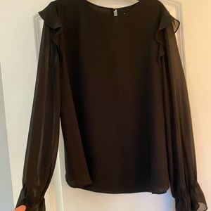 Black blouse.